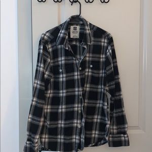 Black shirt and gray flannel